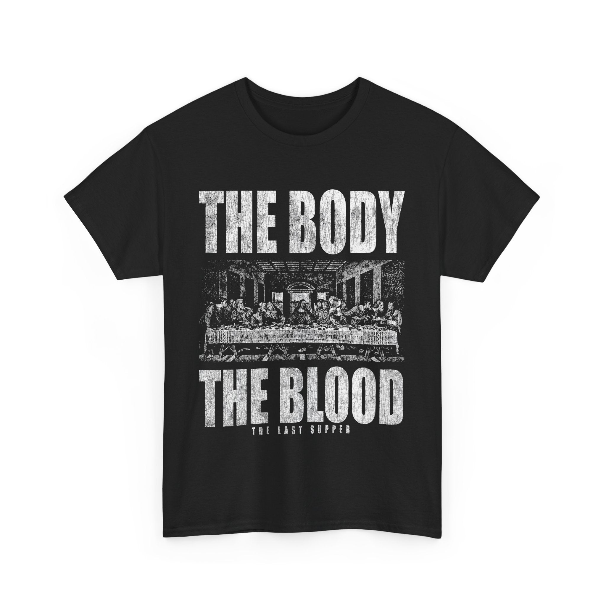 Christian tee flatlay with white Last Supper graphic and “The Body, The Blood” bold lettering